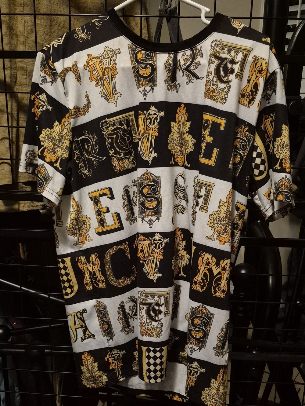 Men's Black and White Graphic Lettering Shirt with Gold Accents